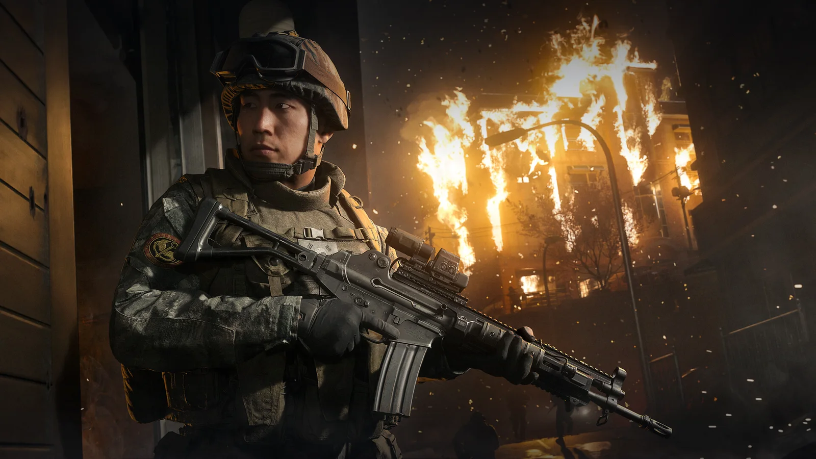Un soldat în fața unei clădiri în flăcări, cadru din Call of Duty: Modern Warfare 4